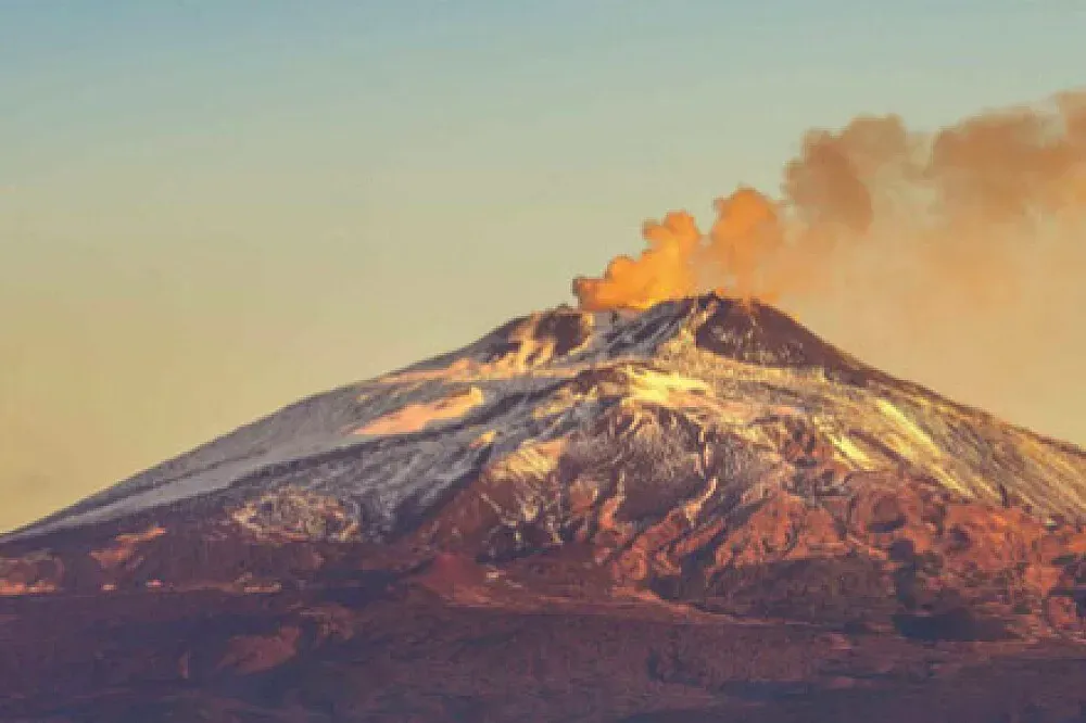 Ater Tumti Sicily — The center is set on a sprawling 15 hectares (37 acres) on the slopes of Mount Etna, featuring picturesque olive groves, lush forest, and traditional dry-stone terraces. The atmosphere is one of profound peace and natural beauty, with views extending towards the sea.