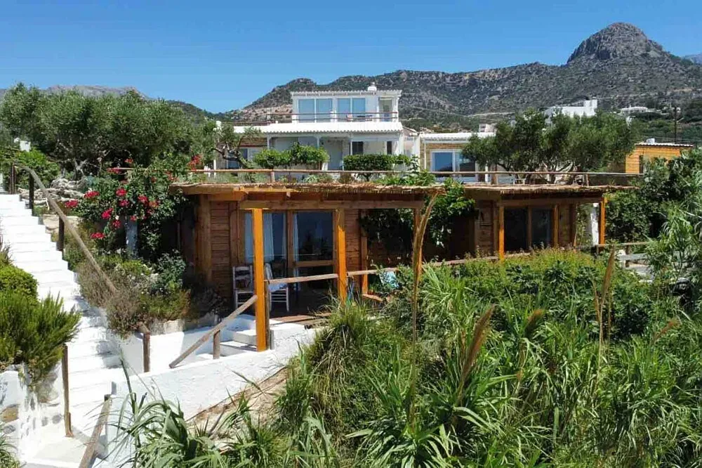 Avital Zion Retreat Center — Perched on the rugged southeastern coast of Crete, the Avital Zion Retreat Center is enveloped by nature's gentle power. Guests are treated to expansive sea views and verdant gardens, creating an atmosphere of profound tranquility. The direct access to the Mediterranean Sea allows for refreshing ocean swims, while the surrounding landscape invites quiet contemplation and connection with the natural world.
