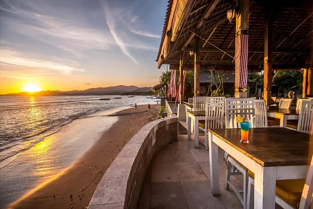 Bali Santi Bungalows — Located in Candidasa, Bali, the bungalows are set in a tropical environment, likely offering lush greenery and proximity to the ocean, providing a naturally calming backdrop for relaxation and introspection.