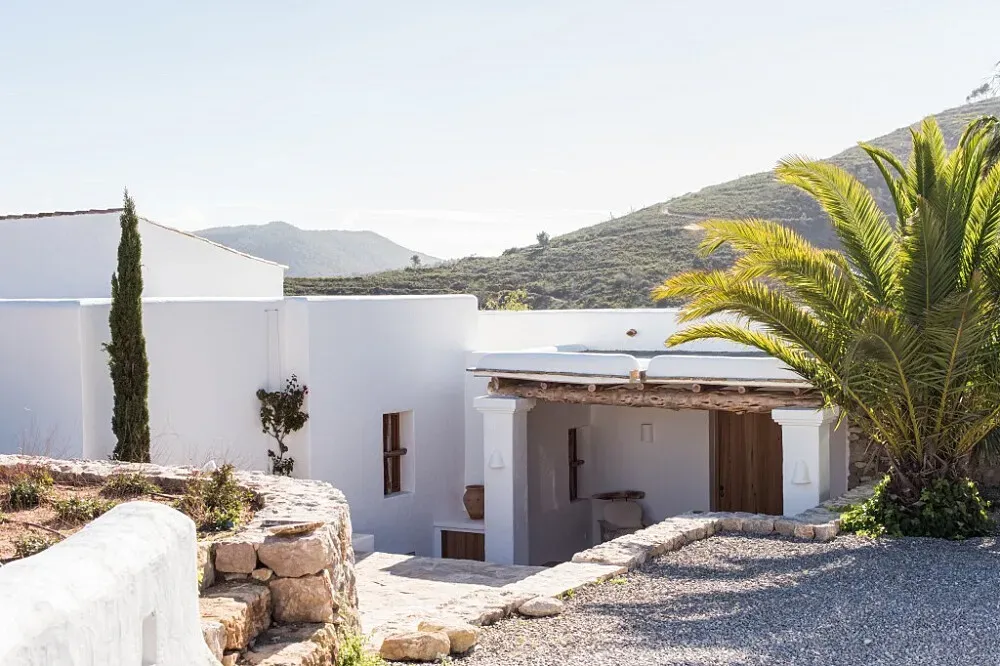 Buddhi Retreat Home — The center is situated in the serene heart of Ibiza, surrounded by soft green hills and untouched nature. Its authentic finca offers mountain views, exuding warmth, harmony, and a timeless sense of peace. It's a quiet, private location, yet conveniently close to Santa Eulària.