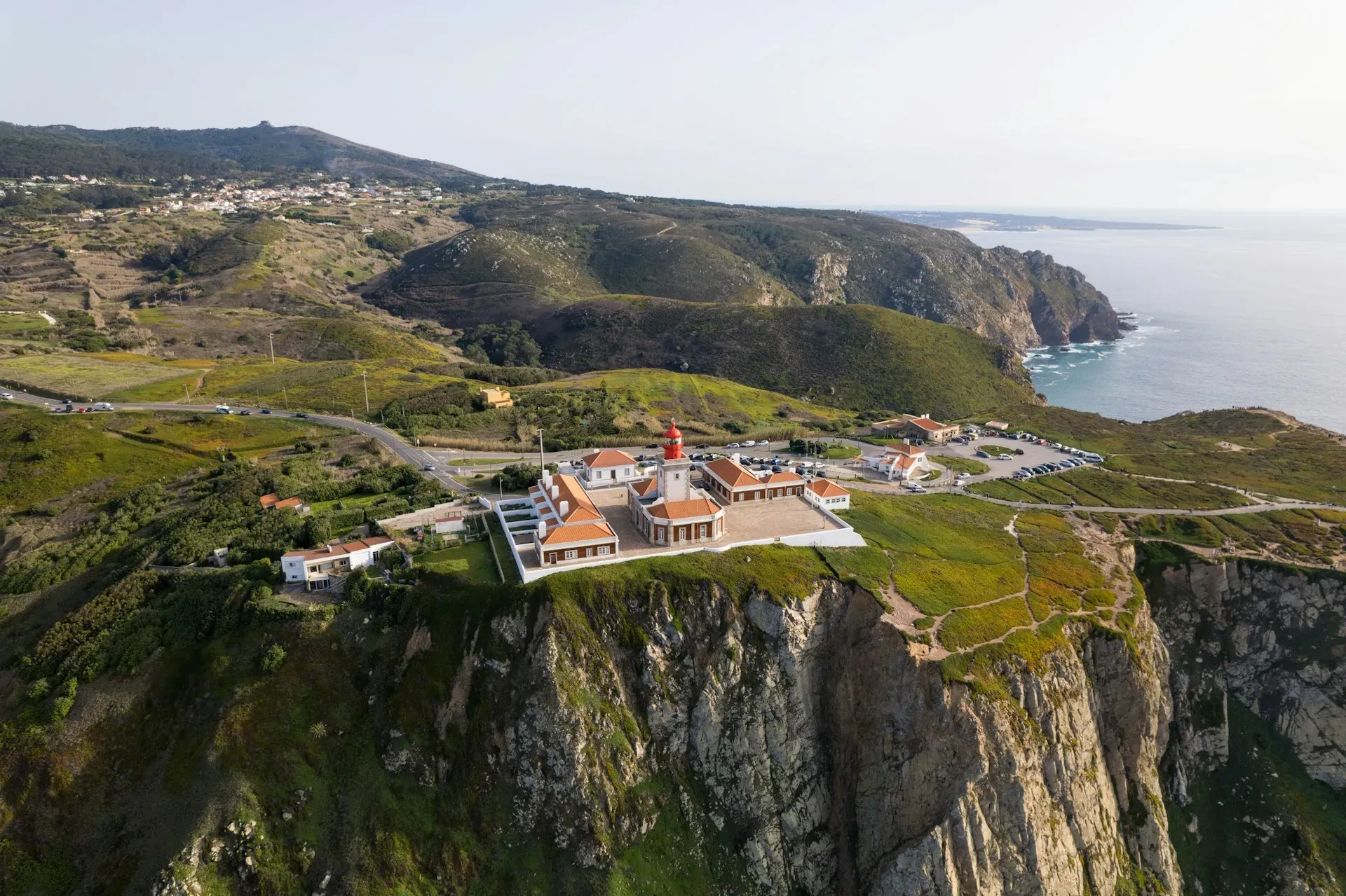CASA PACO D'ILHAS — This center sits on a hilltop, providing views of Ericeira's renowned surf breaks. The surrounding area is characterized by a small, vibrant fishing village and numerous beautiful beaches, offering a blend of coastal beauty and local culture.