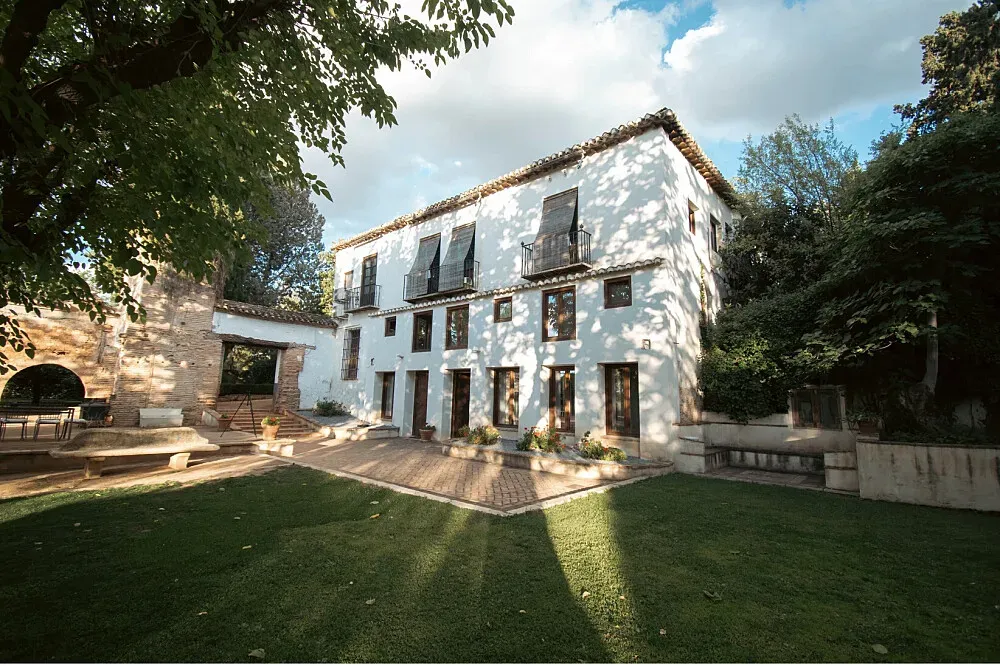 Caseria de Milan — The setting of Caseria de Milan is defined by its extraordinary history. It's a place where the past is palpable, offering a quiet, reflective environment that encourages introspection. The exact landscape is not specified, but the age of the building suggests a connection to traditional, perhaps rural, surroundings.