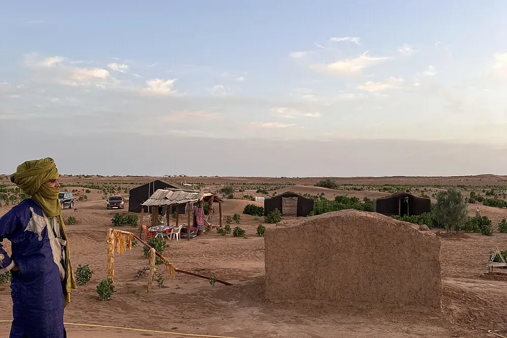 Contes Du Desert — The camp is situated directly in the vast, awe-inspiring Sahara Desert, offering an unparalleled sense of remoteness and natural beauty. Expect endless dunes, starry nights, and the profound silence of the desert landscape.
