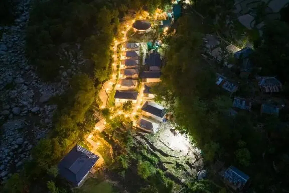 Dev Bhoomi Farms & Cottages — The center is located in Dharamshala, offering a farm stay environment. It combines the tranquility of a farm with luxurious accommodations, emphasizing an atmosphere designed with eco-sensibilities.