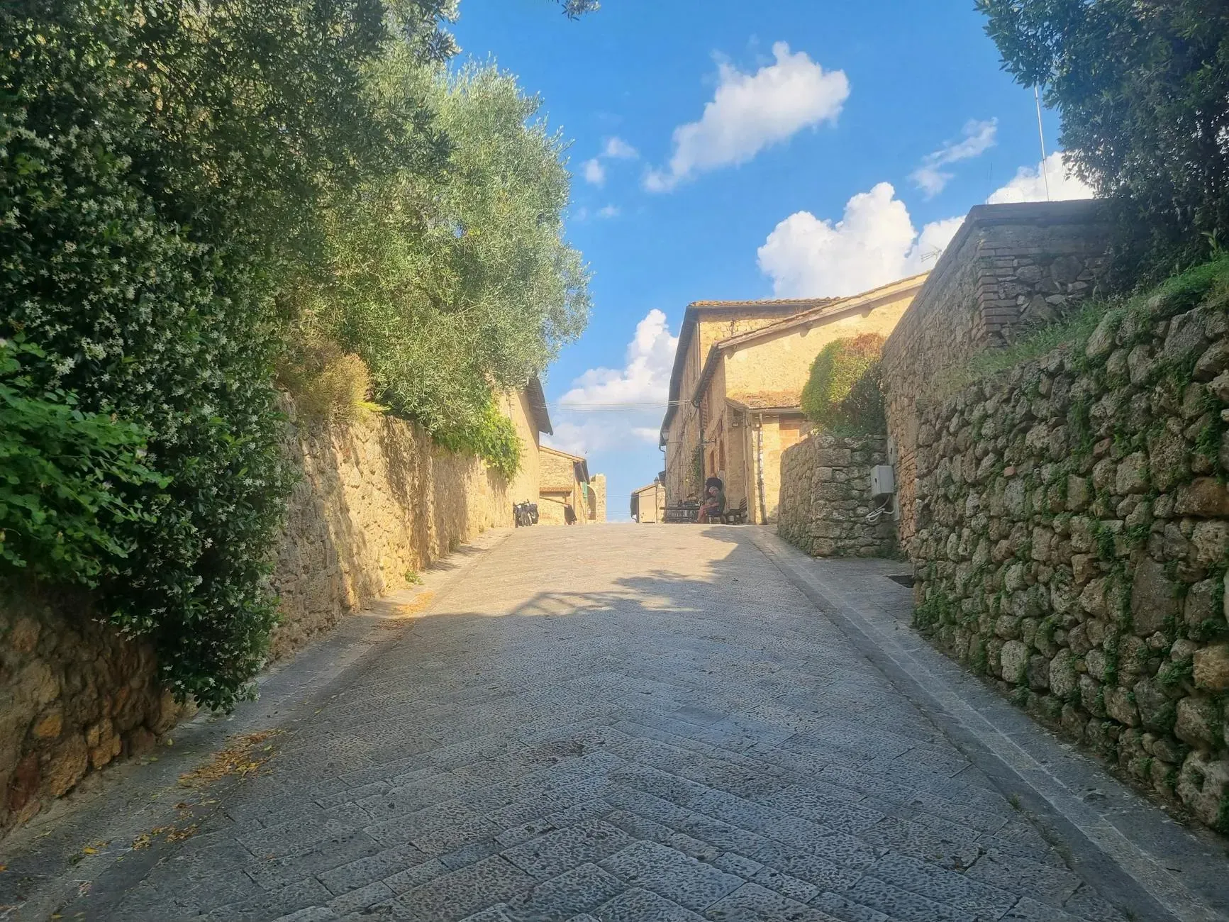Ebbio — Ebbio is situated on an extinct volcano, revered by the Etruscans, and surrounded by an evergreen forest. This unique location provides stunning views of the medieval walled town of Monteriggioni, creating a deeply historical and naturally serene atmosphere.