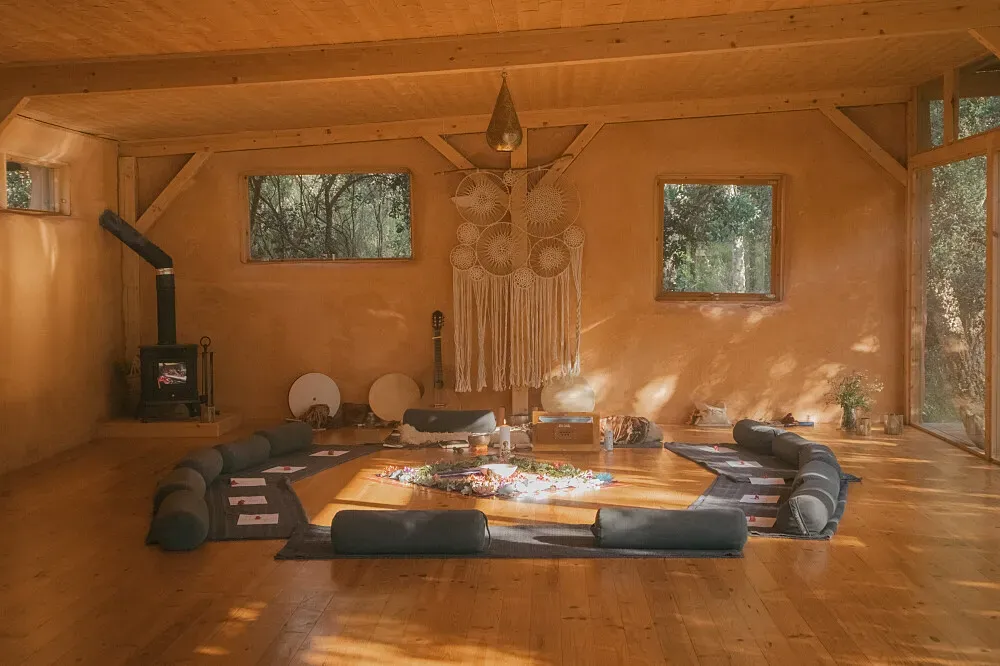 Essencia Nature Retreat — While the exact location remains a mystery, the description paints a picture of a wild, natural environment. Expect close proximity to beaches, suggesting a coastal setting, and the presence of a natural pond implies a lush, perhaps secluded, landscape. The emphasis on outdoor activities like kayaking and surfing, alongside permaculture gardening, points to an immersive experience deeply connected to its natural surroundings.