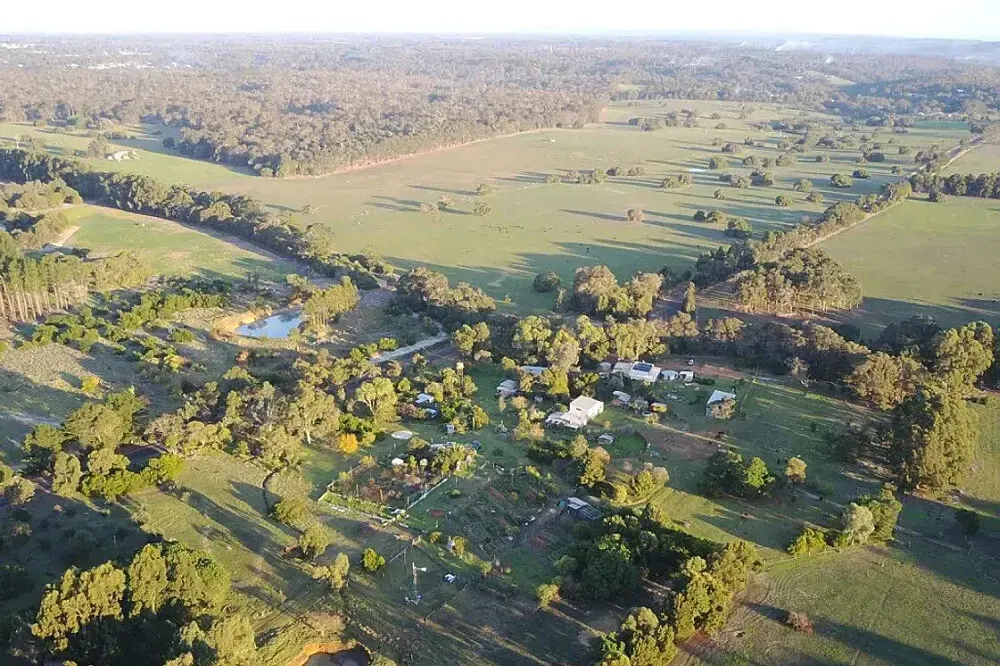 Fair Harvest Permaculture Farm — The farm is set amidst the natural beauty of Margaret River, Western Australia, just 4km from the town center. Guests can explore extensive food gardens, mature permaculture systems, and enjoy tranquil farm and forest walks. The atmosphere is one of quiet sustainability and connection with nature.