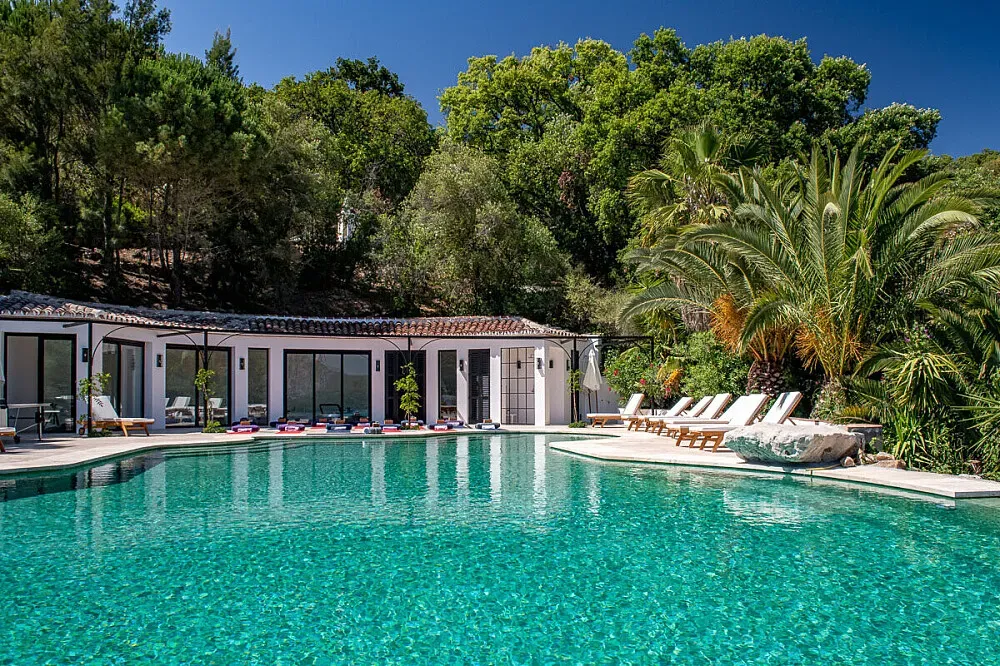 Finca Avedin — The center is a traditional farmhouse, lovingly restored and situated within a pristine, private forest. It commands breathtaking views of the surrounding mountains and valleys, creating a deeply peaceful and natural environment.