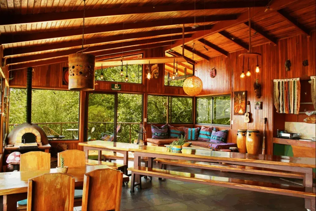 Finca Camino Nuevo — set within the lush cloud forest of Monteverde, Finca Camino Nuevo provides an immersive natural experience. The property is designed to integrate seamlessly with its surroundings, offering stunning mountain views and an organic forest garden. The atmosphere is one of tranquility and intentional design, with structures built from local materials that echo the natural beauty of Costa Rica.
