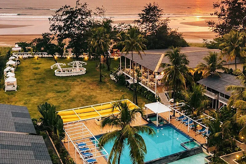 Foxoso La Beach Resort — The resort is situated directly on Morjim Beach, a quiet stretch of coastline in North Goa. This area is renowned for its calm waters and is a known turtle-nesting site, offering a peaceful, natural environment. The atmosphere is one of relaxed mornings and a gentle pace, providing a perfect escape from more crowded areas.