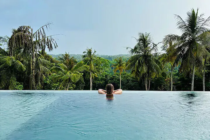 Green Escapes — Hidden within acres of lush jungle, Green Escapes provides a secluded and tranquil environment. The atmosphere is one of laid-back luxury, deeply connected to the natural world, offering a peaceful respite from the outside world. It's a place where the sounds of the jungle become your soundtrack.
