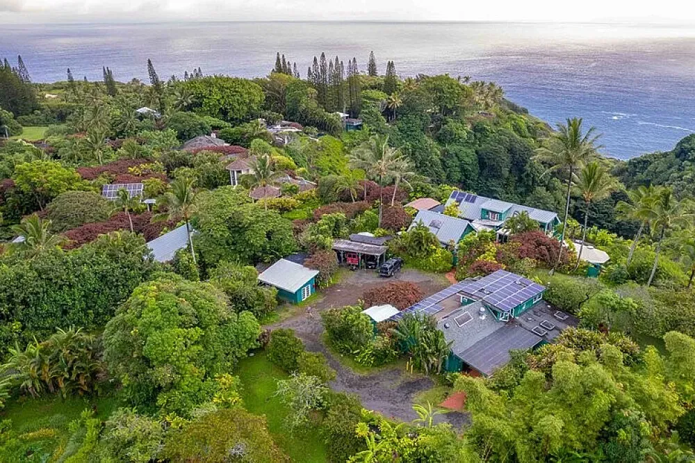 Hale Akua Garden Farm & Eco-Retreat Maui — Perched on Maui's north shore, where lush emerald cliffs dramatically meet the Pacific, Hale Akua offers an oceanfront, jungle-lined sanctuary. The atmosphere is one of profound tranquility, designed to naturally slow down time and encourage deep relaxation. Mornings are greeted by the sounds of the sea and local birds, while days unfold amidst garden paths, ocean-view decks, and serene practice areas.