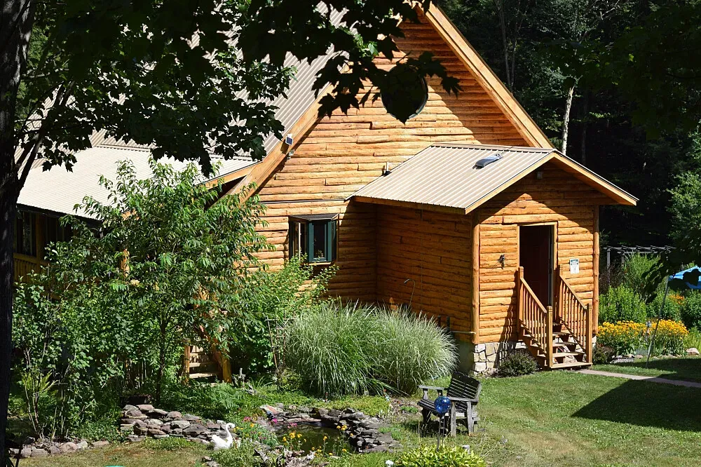 Holistic Horizons at Fiddlehead Grove Retreat and Healing Center — The center is situated at the base of the Adirondack Mountains in Central New York, offering a naturally tranquil environment. Gardens, ponds, and woodland trails contribute to a peaceful atmosphere, ideal for quiet contemplation and nature observation. Two distinct labyrinths are also available for walking meditation.