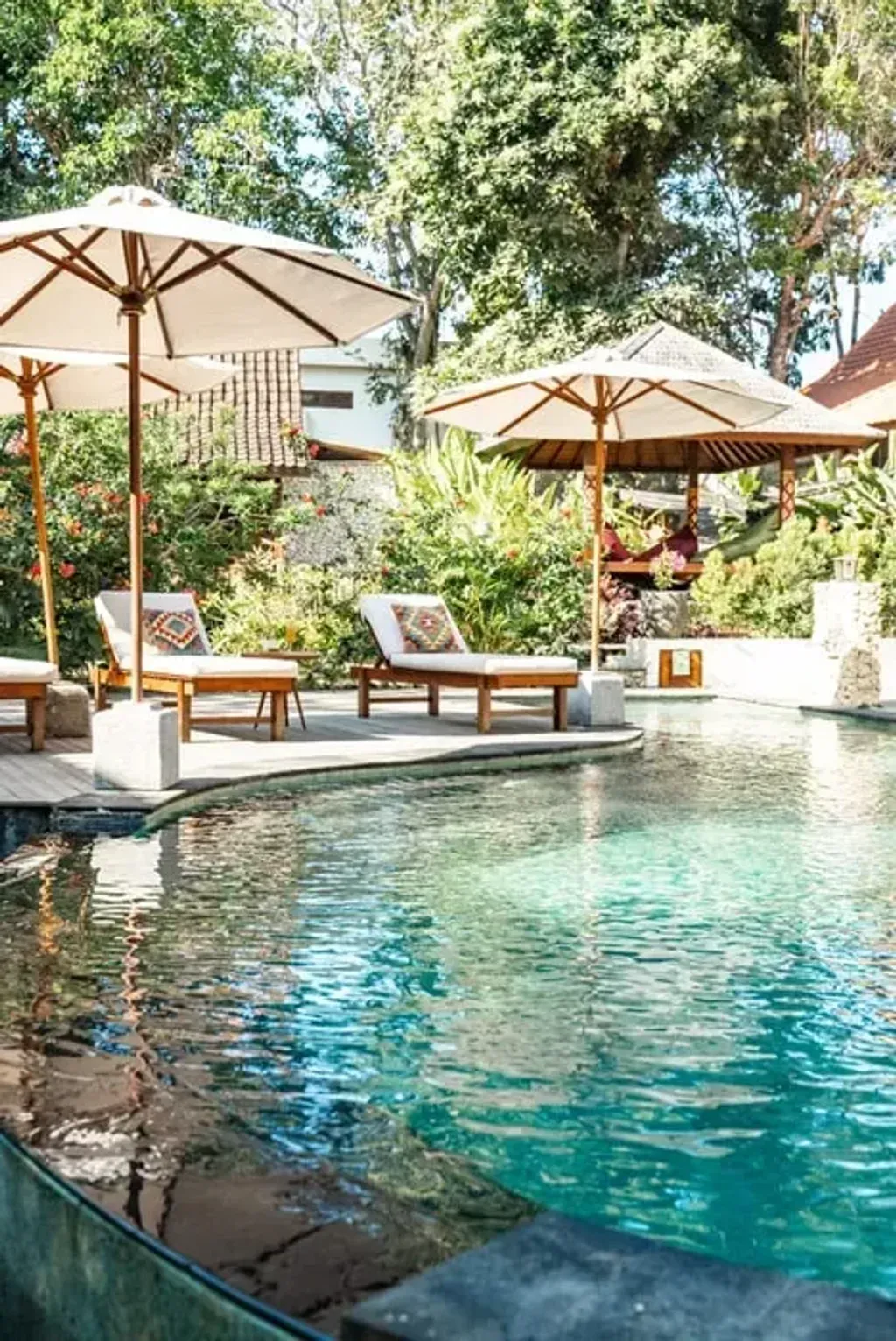 Kayu Mama Resort & Spa — set within the lush Bukit forest of Uluwatu, Bali, Kayu Mama Resort & Spa provides a serene and natural environment. The resort's design embraces Indonesian-style architecture, with wooden accommodations that harmonize with the surrounding landscape, creating a tranquil atmosphere for relaxation and self-discovery. It's also conveniently located close to Bali's renowned beaches and ancient temples.