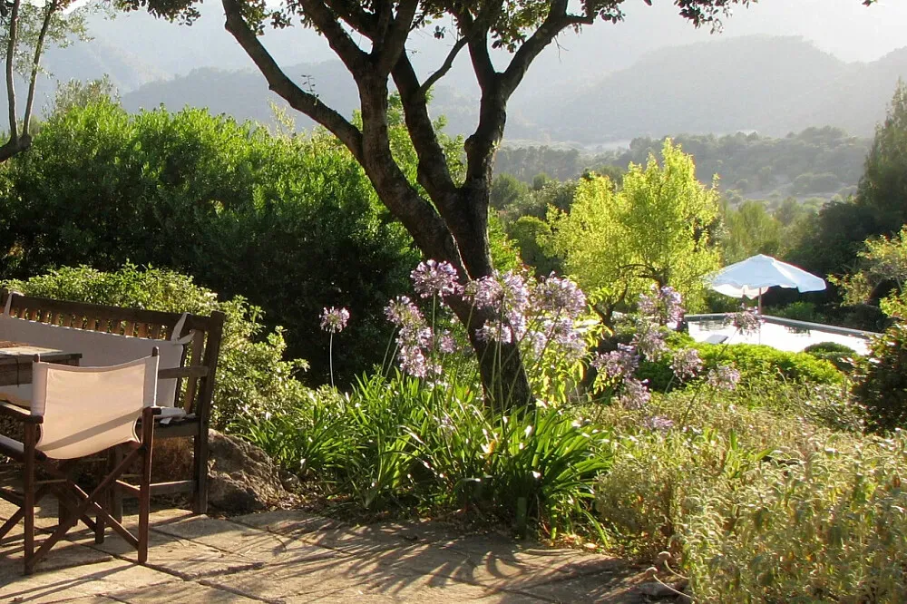 La Serranía, Mallorca — This center is located in the foothills of the Serra de Tramuntana mountains in northern Mallorca. Surrounded by oak woods and olive groves, and built on limestone, the clear and serene architecture completely blends into the Mediterranean setting, creating a sense of harmony and wholeness.