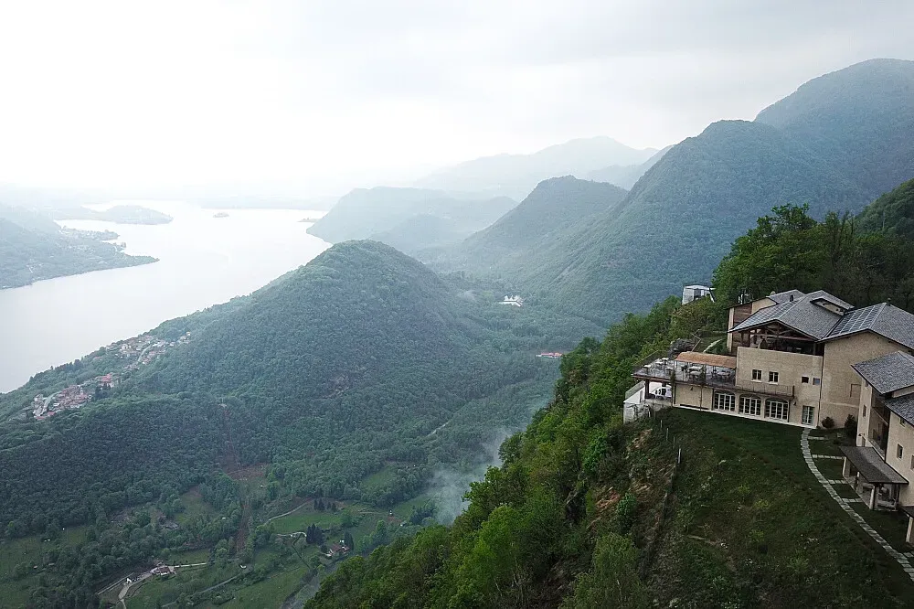 Mandali Retreat Centre — Mandali Retreat Centre is situated high in the Italian Pre-Alps, nearly a kilometer above sea level, providing stunning panoramic views over the crystal clear Lake Orta. The surrounding mountains and nature offer a serene and invigorating atmosphere, with clear mountain air and a sense of being truly above the everyday.