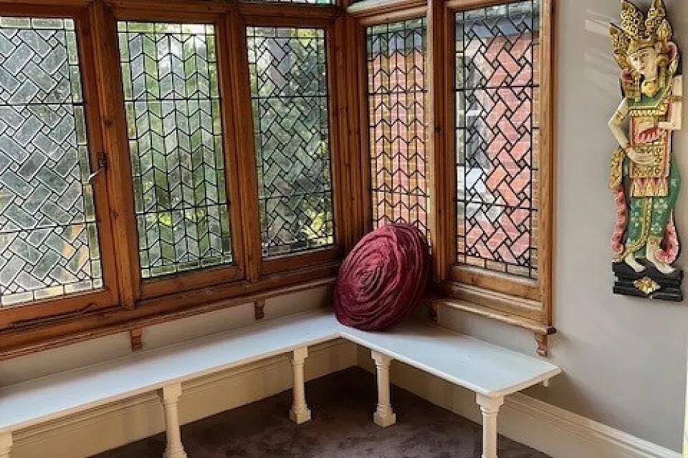 Mountfield Retreat — The retreat is housed in a grand Victorian building from 1876, located in Tonbridge, UK, about 35 miles south of London. The atmosphere is one of serene dedication, with the renovated interiors specifically designed to support retreat practices, featuring adornments like Buddhas.