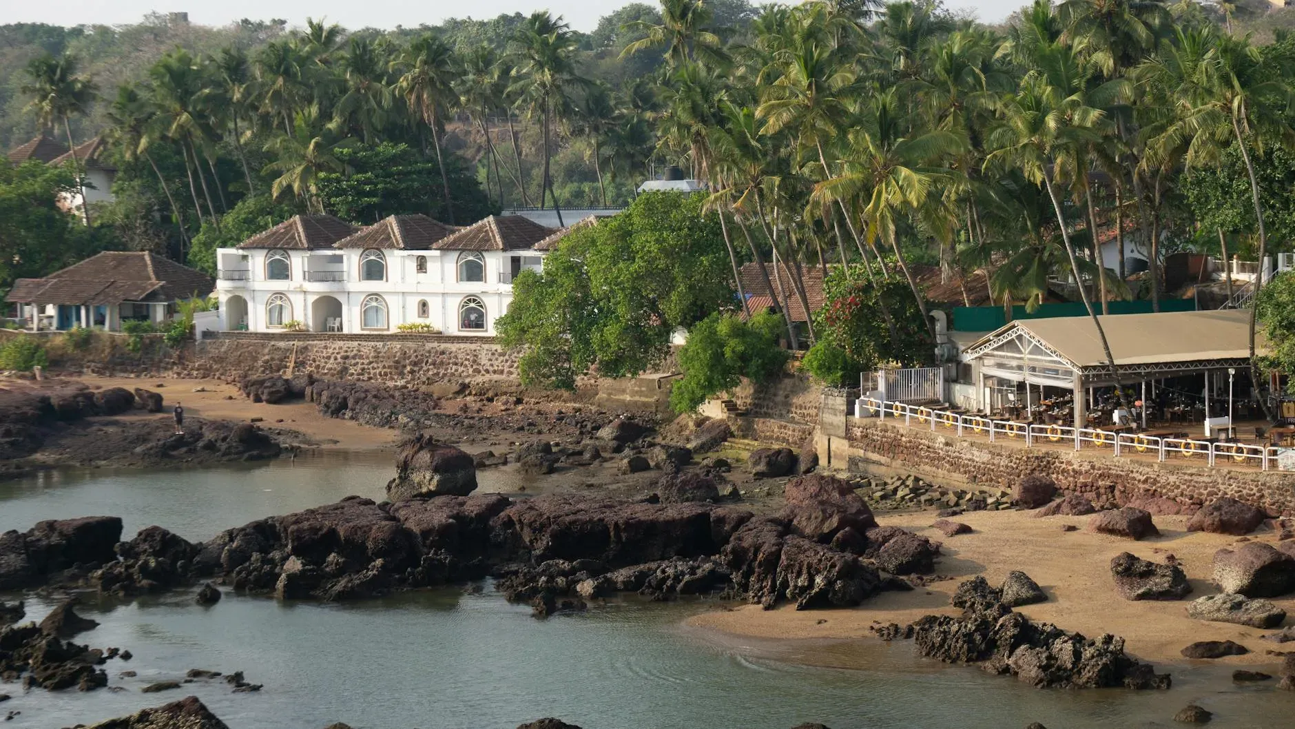 Nalanda Retreat Center — Situated directly on Mandrem Beach, Nalanda Retreat Center boasts a serene coastal environment. The sound of the waves and the gentle sea breeze create a naturally calming atmosphere, ideal for relaxation and introspection. The lush surroundings and open spaces invite guests to connect with nature, offering a peaceful escape from the everyday hustle.