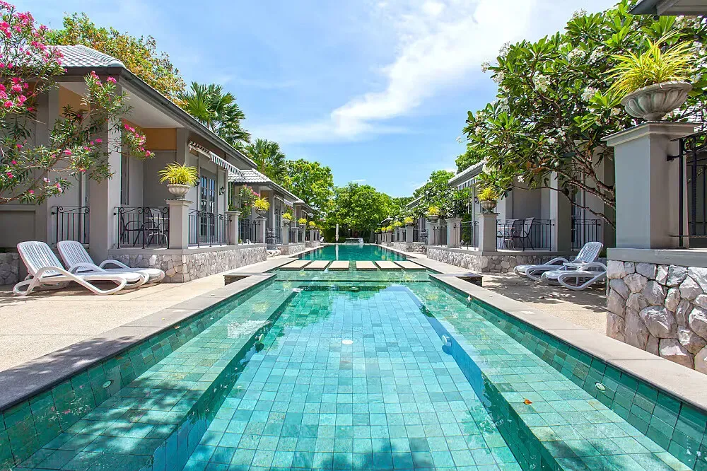 Pattaya Retreat Villas — Located in the heart of Pattaya City, this retreat offers an unusual juxtaposition of vibrant urban life just outside its doors and a presumably tranquil environment within. While specific details about the grounds are scarce, one can imagine a serene space designed to shield guests from the city's hustle, providing a peaceful haven for reflection.