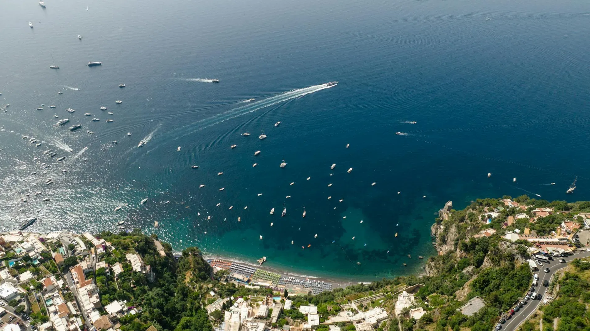 Positano Paradise — Perched in the iconic coastal town of Positano, the center boasts an unparalleled natural backdrop. The Mediterranean Sea provides a constant, calming presence, while the dramatic cliffs of the Amalfi Coast create a sense of awe and grandeur, making for a truly inspiring atmosphere.