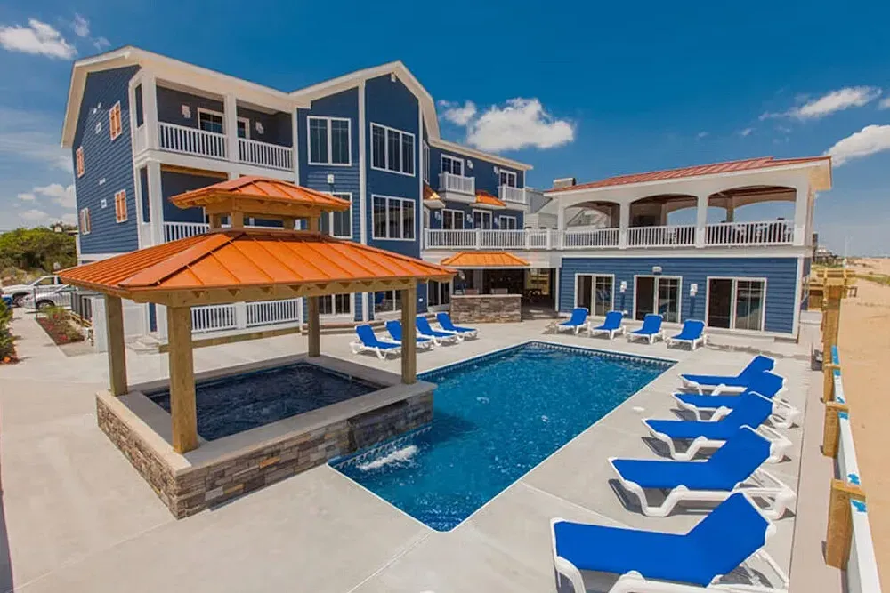 Private Home In Virginia Beach — The retreat unfolds in a spacious oceanfront beach house located in Sandbridge Beach, a quiet coastal community within Virginia Beach. The atmosphere is one of peaceful seaside living, with the Atlantic Ocean as your backdrop, offering a tranquil environment for reflection and connection.