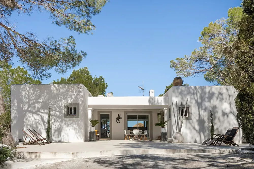 Private Villa Ibiza — This private villa is set in the scenic landscape of Ibiza, near San Jose, and is enveloped by a peaceful pine forest. The location offers a strong sense of privacy and tranquility, with the added benefit of being just a short drive from the coast. It's a place where you can truly feel connected to nature while enjoying the comforts of a private residence.