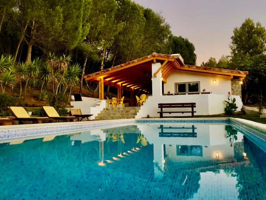 Quinta Camarena — Located in Cercal do Alentejo, Portugal, Quinta Camarena is surrounded by extensive trails and gardens, offering private lounge areas nestled among the trees. The natural landscape provides a serene backdrop for relaxation and exploration.