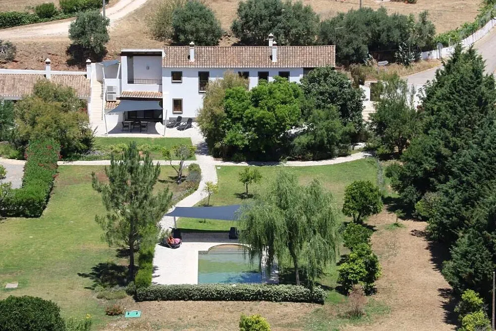 Quinta Fronteira — The center is situated on a private 20-hectare estate known as Vale das Canas, offering ample space and a sense of seclusion. Its location in the Algarve, near Bensafrim and Lagos, suggests a landscape of natural beauty, likely featuring rolling hills or coastal influences, providing a peaceful backdrop for retreat activities.