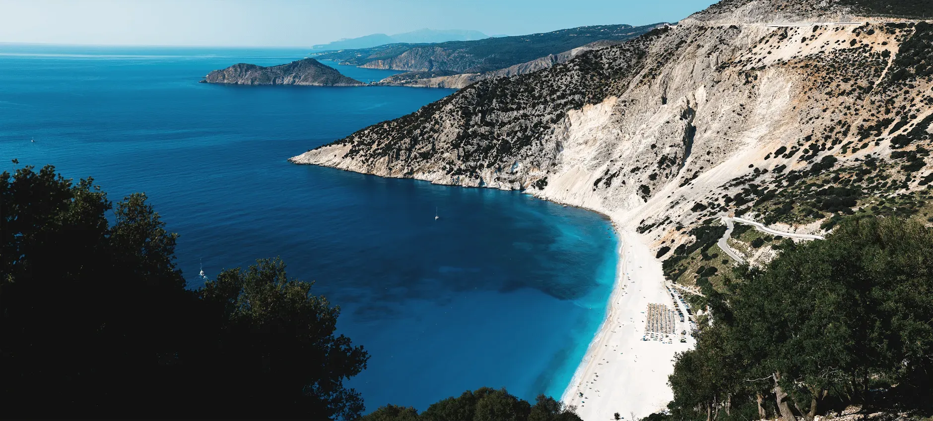 Ranzo Ionio Cottages — Nestled on a panoramic hillside in Tzamarelata village, northern Kefalonia, Ranzo Ionio Cottages provides an idyllic setting. Guests are treated to outstanding views of the Ionian Sea and spectacular sunsets, creating a serene and inspiring atmosphere.