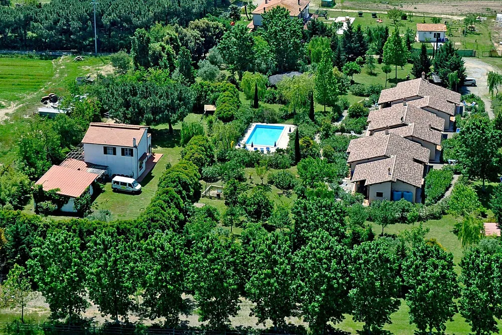 Residence I Salici del Pingrosso — The residence is situated in the Province of Grosseto, a region celebrated for its natural beauty and proximity to the Tuscan Maremma's famous beaches. The atmosphere is one of peaceful seclusion, surrounded by the gentle landscapes of the Italian countryside, yet conveniently close to the vibrant coastline.