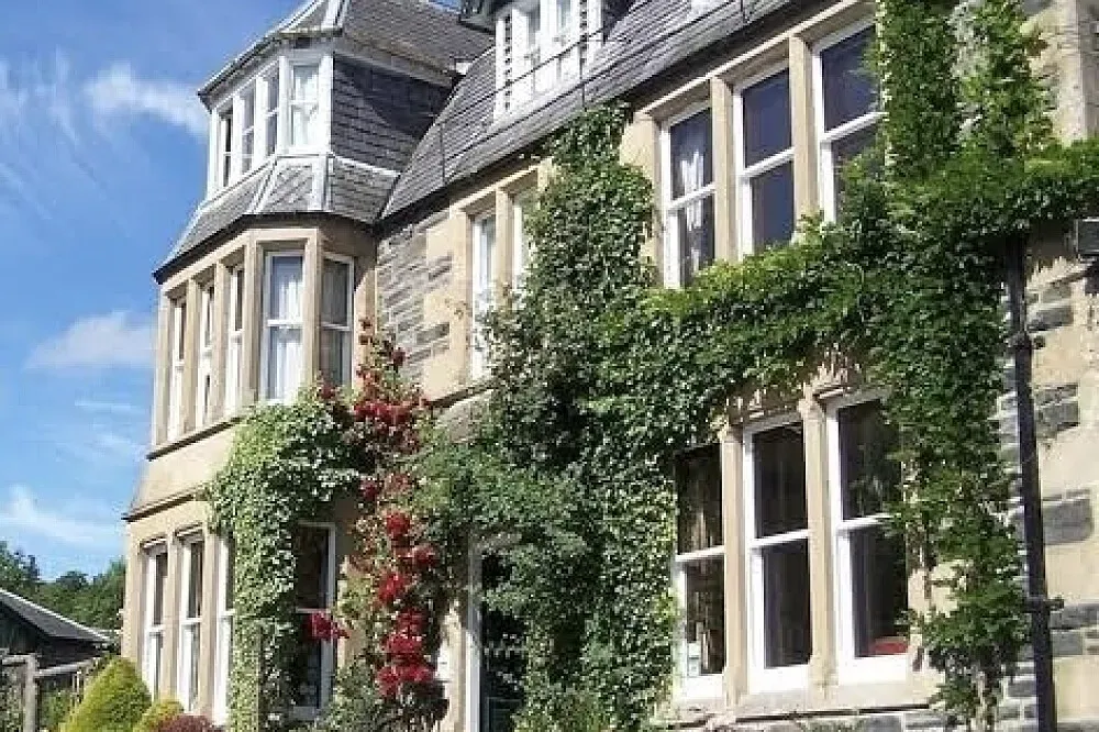 Retreat Hotel — Strathpeffer, a Victorian spa village in the Scottish Highlands, is known for its mineral springs and picturesque landscapes. The area offers a tranquil backdrop of rolling hills and lush greenery, ideal for quiet contemplation and outdoor exploration. Expect fresh air and a sense of peaceful remoteness.