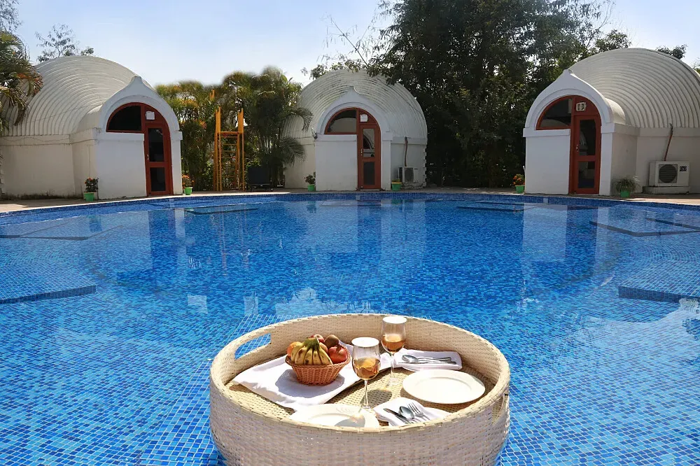 Sambodhi Retreat — Sambodhi Retreat is situated in the historically significant city of Bodh Gaya, Bihar. The center is surrounded by extensive, verdant gardens, creating a naturally calming and secluded atmosphere that feels far removed from urban noise and distractions.