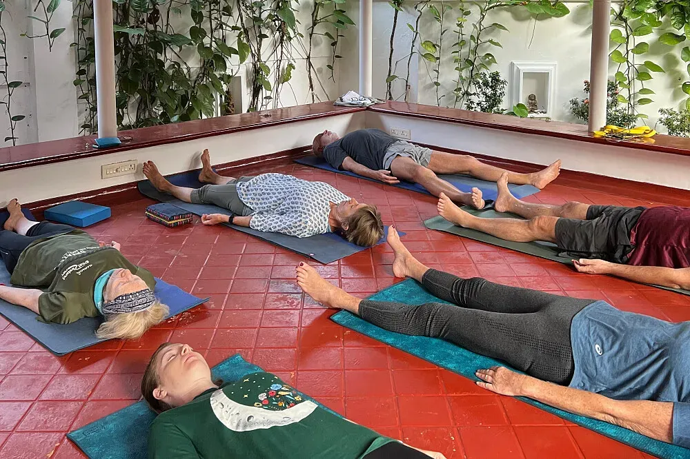 Santhi Yoga — Fort Kochi is a charming coastal town known for its colonial architecture, Chinese fishing nets, and a relaxed, artistic atmosphere. The center is situated within this picturesque environment, offering a blend of cultural immersion and serene practice space. Expect a tropical climate with lush greenery and the sounds of the nearby sea.