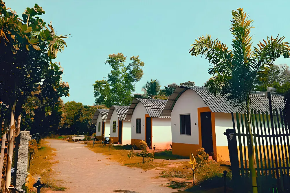 Sreeveda Wellness Resort — The resort is situated in Kochi, offering a calm and serene environment that provides a peaceful escape from the hustle and bustle. While specific details about the immediate landscape are not provided, the emphasis on a tranquil background suggests a natural and restorative atmosphere.