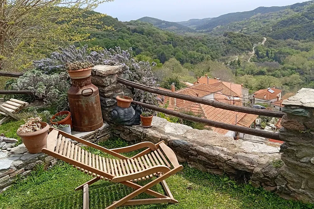Stone House Off Art-Melivoia, Central  Greece — The Stone House Off Art is situated in the non-touristic village of Melivoia, offering a serene escape. It sits 400-500 meters above sea level, providing expansive, breathtaking views of the surrounding landscape. Just 8 km away lies one of Greece's longest coastlines, while the majestic Kissavos mountain invites exploration.