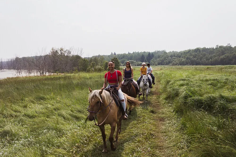 Sturgeon River Ranch — The ranch is located on the Wild West Side of Prince Albert National Park, an ecoregion known for its diverse wildlife and expansive natural beauty. Guests are immersed in a landscape where plains meet forest, offering a chance to observe animals in their historic habitats.
