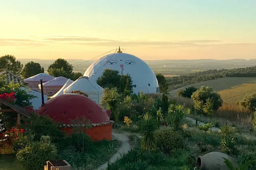 Suryalila Retreat Centre — Suryalila Retreat Centre is situated amidst the picturesque Andalusian hills of southern Spain. The landscape is characterized by rolling hills and a serene, natural environment, providing a tranquil backdrop for reflection and practice. The atmosphere is one of peace and rejuvenation, encouraging guests to unwind and connect with nature.