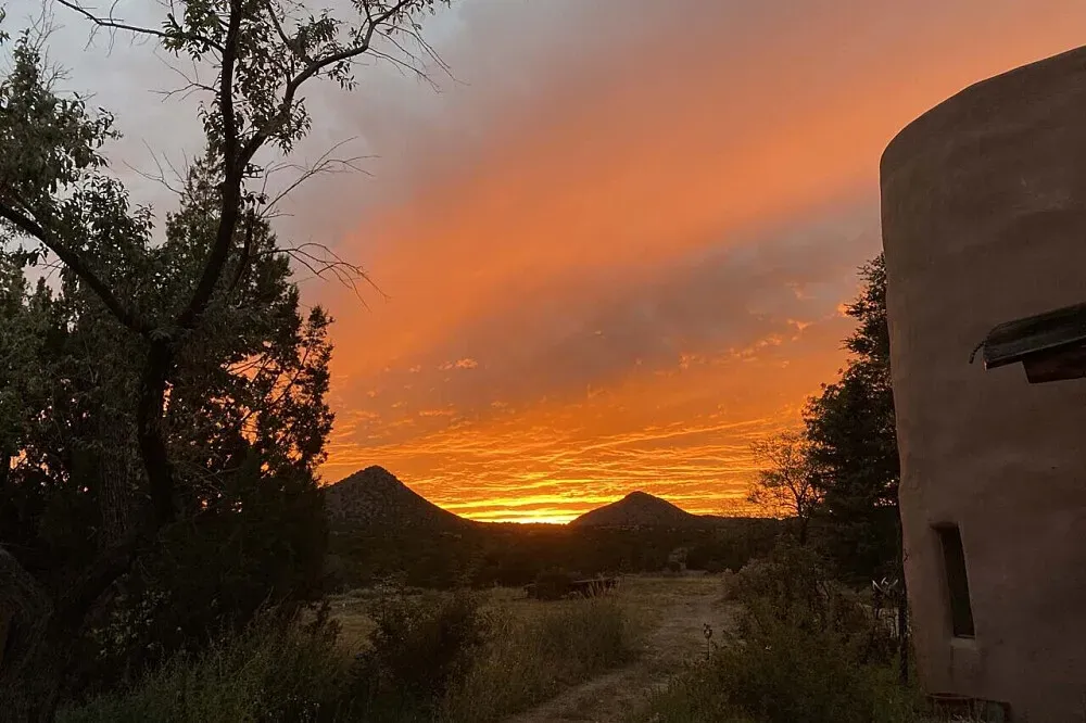 Synergia Ranch and Retreat Center — The center is situated in a beautiful high temperate grassland and juniper ecosystem, about a half-hour south of Santa Fe and an hour from Albuquerque. It lies in the foothills of the historic Cerrillos Hills, an ecological and cultural oasis that has benefited from decades of restoration work, attracting a rich diversity of migratory birds.