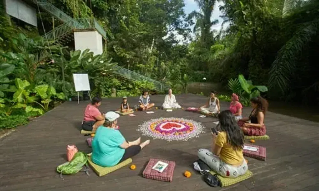 Tattva Ubud, Retreat & Wellness — Tattva Ubud is situated in the verdant, riverside landscape of Ubud, Bali. The center is enveloped by lush greenery, creating a serene and natural atmosphere. Guests can expect to be surrounded by the calming sounds and sights of nature, with the added spiritual presence of nearby sacred temples.