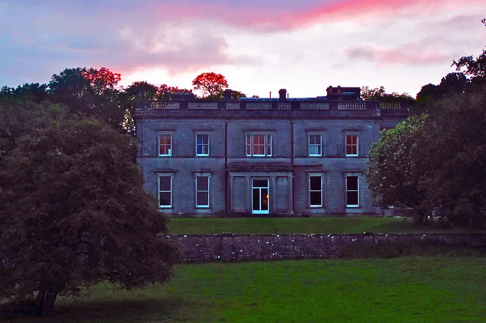 Temple House — The center is set on a sprawling 1,000-acre private estate in County Sligo, offering breathtaking views of a 13th-century Knights Templar castle situated beside a tranquil lake. The atmosphere is one of historic grandeur and peaceful seclusion.