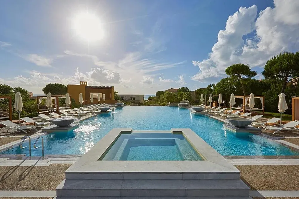 The Westin Resort - Costa Navarino — set in the southwest Peloponnese, the resort is enveloped by rolling olive groves and boasts direct access to the crystal-clear waters of the Aegean Sea. The atmosphere is one of sophisticated tranquility, blending natural beauty with high-end comfort.