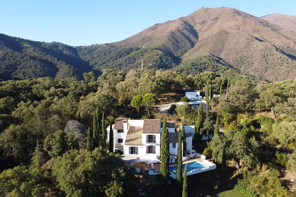 Villa Esencia — Villa Esencia is situated amidst the picturesque Casares mountains in Andalusia, part of Spain's beautiful Costa del Sol. The rural location provides a serene and natural backdrop, fostering an atmosphere of tranquility and escape from urban bustle. Expect stunning views and a sense of calm pervading the property.