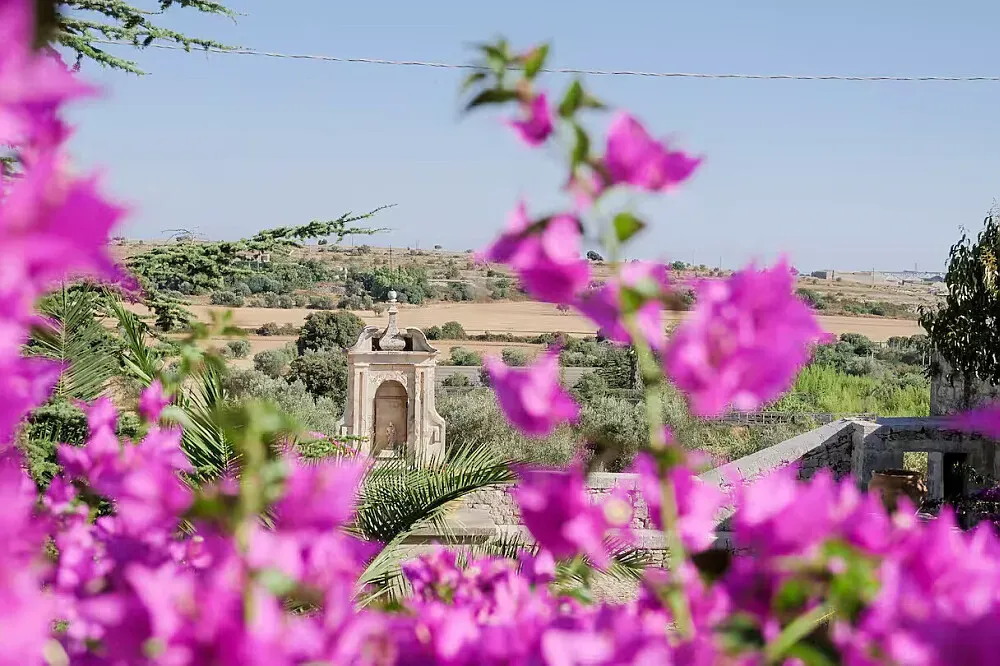 Villa Modica — The retreat is situated in the picturesque Sicilian countryside, offering a tranquil escape from the everyday. The historic villa is surrounded by spacious gardens, providing a peaceful atmosphere. The nearby baroque town of Modica adds a touch of cultural richness, while the close proximity to the coast means refreshing sea breezes are never far away.