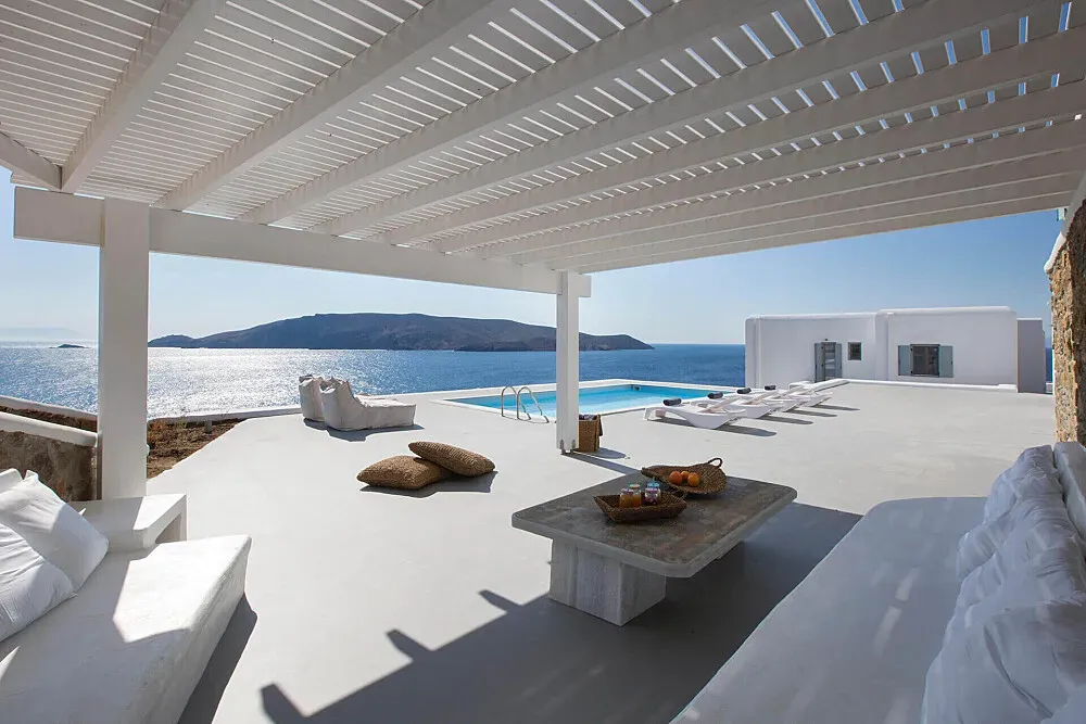 Villa Petra & Villa Anemos — set in a secluded part of Mykonos, near the peaceful Tigani beach, the villas are designed to blend seamlessly with the island's natural beauty. Guests can expect breathtaking views of the Aegean Sea and a tranquil atmosphere, far from the typical Mykonian crowds.