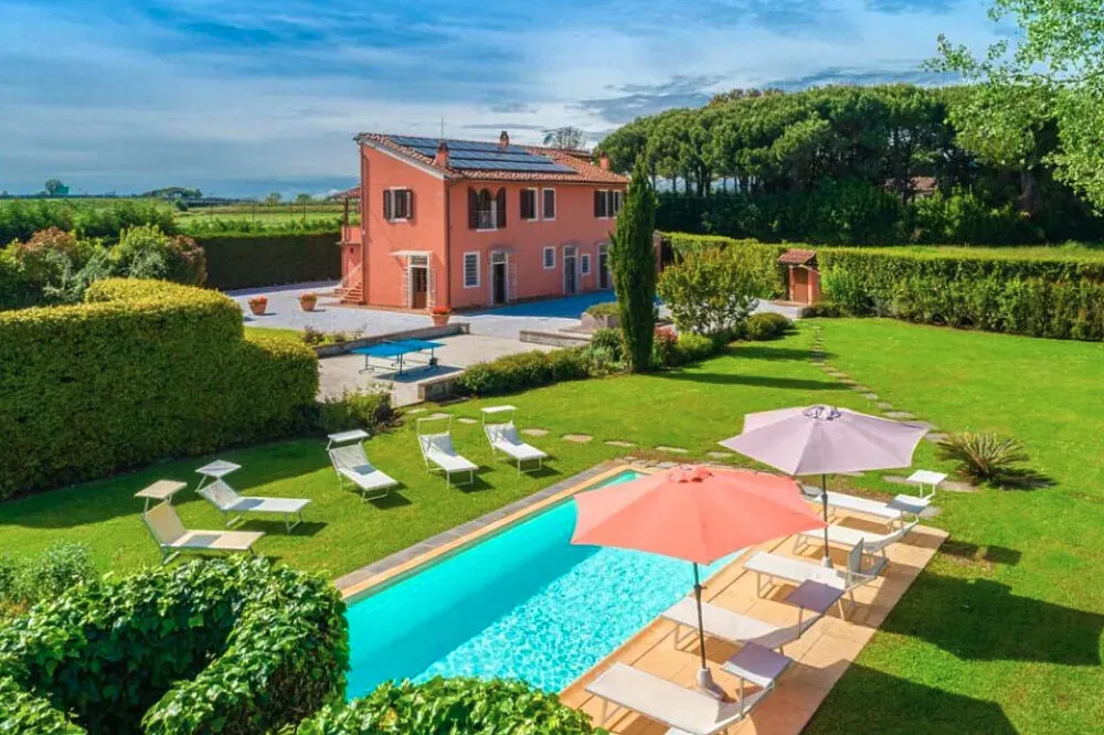 Villa Rossa — The exact setting of Villa Rossa is not detailed, but its location in England suggests a potential for lush green landscapes or charming rural surroundings. The atmosphere appears to be relaxed and informal, encouraging a sense of discovery rather than adherence to a strict program.