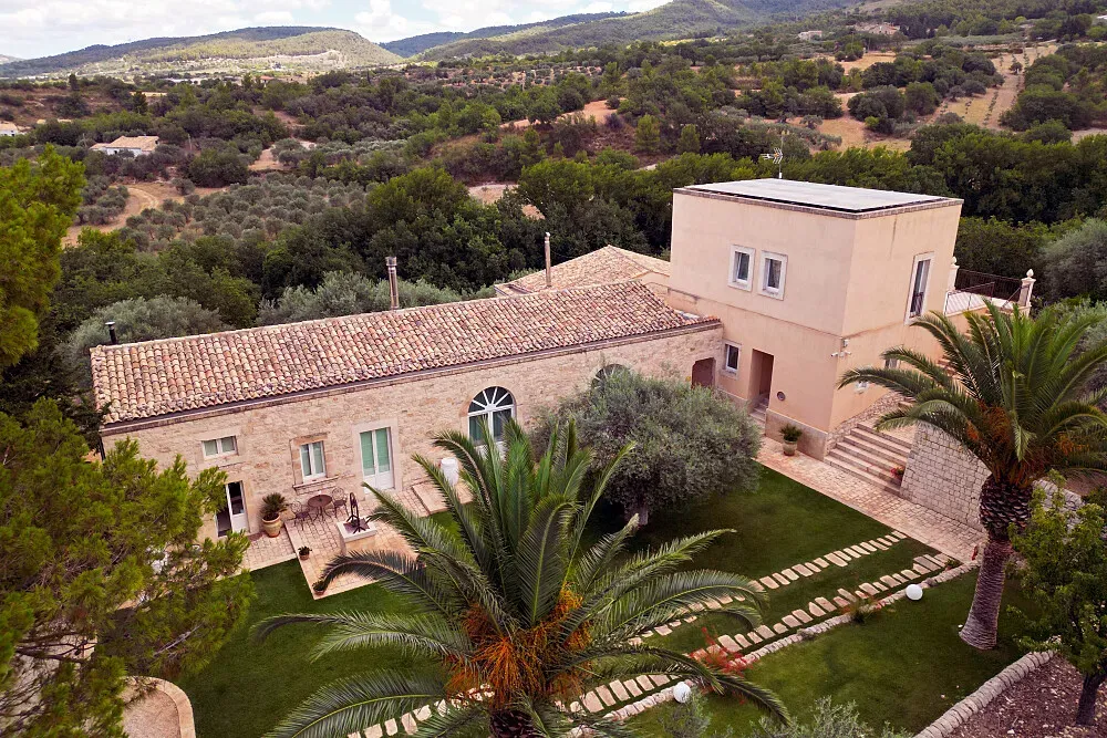 Villa Santa Margherita — The villa is set amidst the picturesque Monti Iblei region of south-eastern Sicily, offering a tranquil and historic backdrop for reflection. The landscape is characterized by rolling hills and a sense of timeless Mediterranean beauty.
