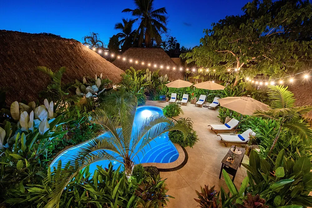 Villa Tayrona — Located in the vibrant coastal town of Bucerías, Villa Tayrona provides a peaceful sanctuary. The design aesthetic marries contemporary Mexican elements with the serene, natural feel of Balinese architecture, creating an atmosphere of relaxed elegance. Guests can enjoy the lush surroundings and the calming influence of the ocean nearby, fostering a sense of escape and rejuvenation.