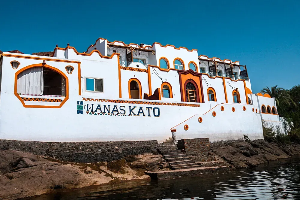 Wanas Kato — Situated directly on the banks of the Nile in Aswan, Wanas Kato boasts a private beach area. The atmosphere is one of peaceful riverside living, with opportunities to enjoy sunrises and sunsets over the water from a sun terrace or private balcony.