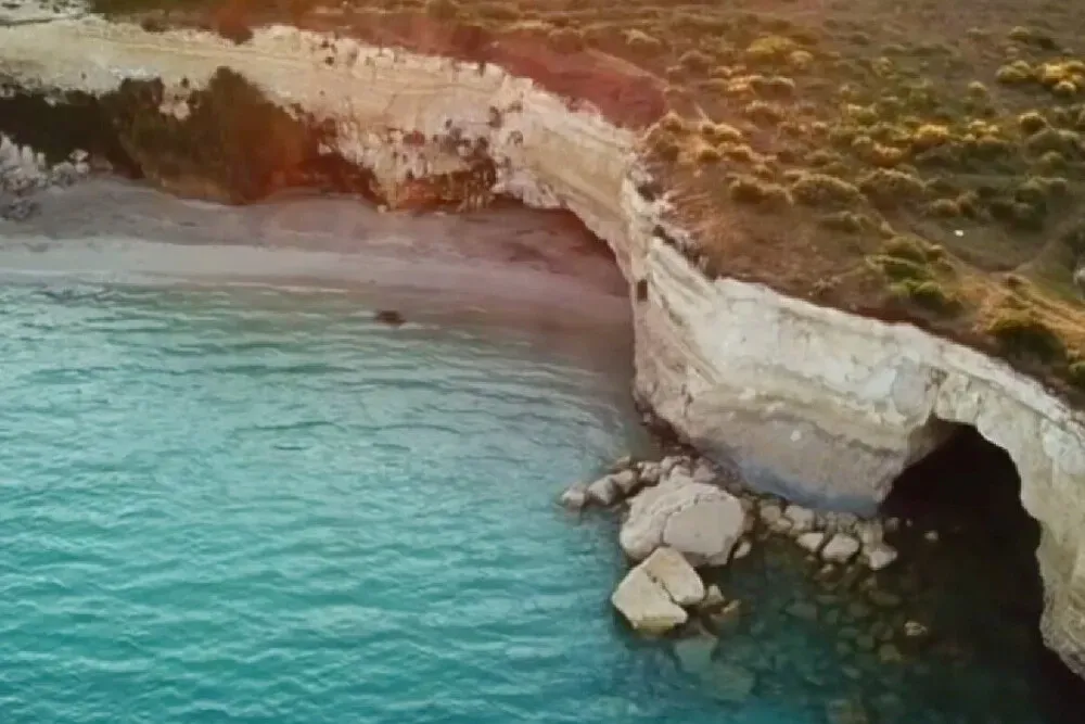 Yoga  in  Salento — The center is an organic agritourism, suggesting a rural setting surrounded by nature, likely with cultivated land. The emphasis on sustainability and conscious living points to a peaceful and restorative atmosphere, far from the hustle and bustle.