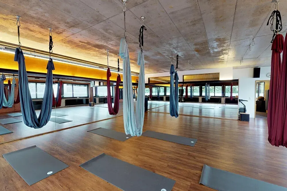 YogaCorner — Situated in Schlieren, the studio benefits from its proximity to a green park, offering a pleasant outdoor space for relaxation during sunny periods. The urban setting is balanced by this natural element, creating a convenient yet refreshing environment.
